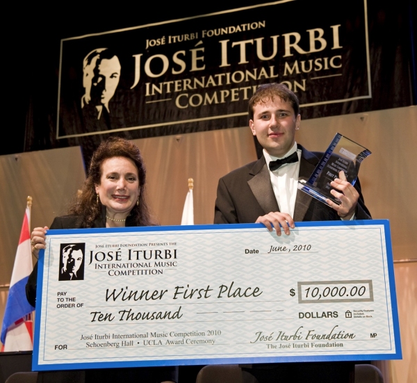 Donelle Dadigan Co-Founder & President with the winner of First Prize for piano, Stan Photo